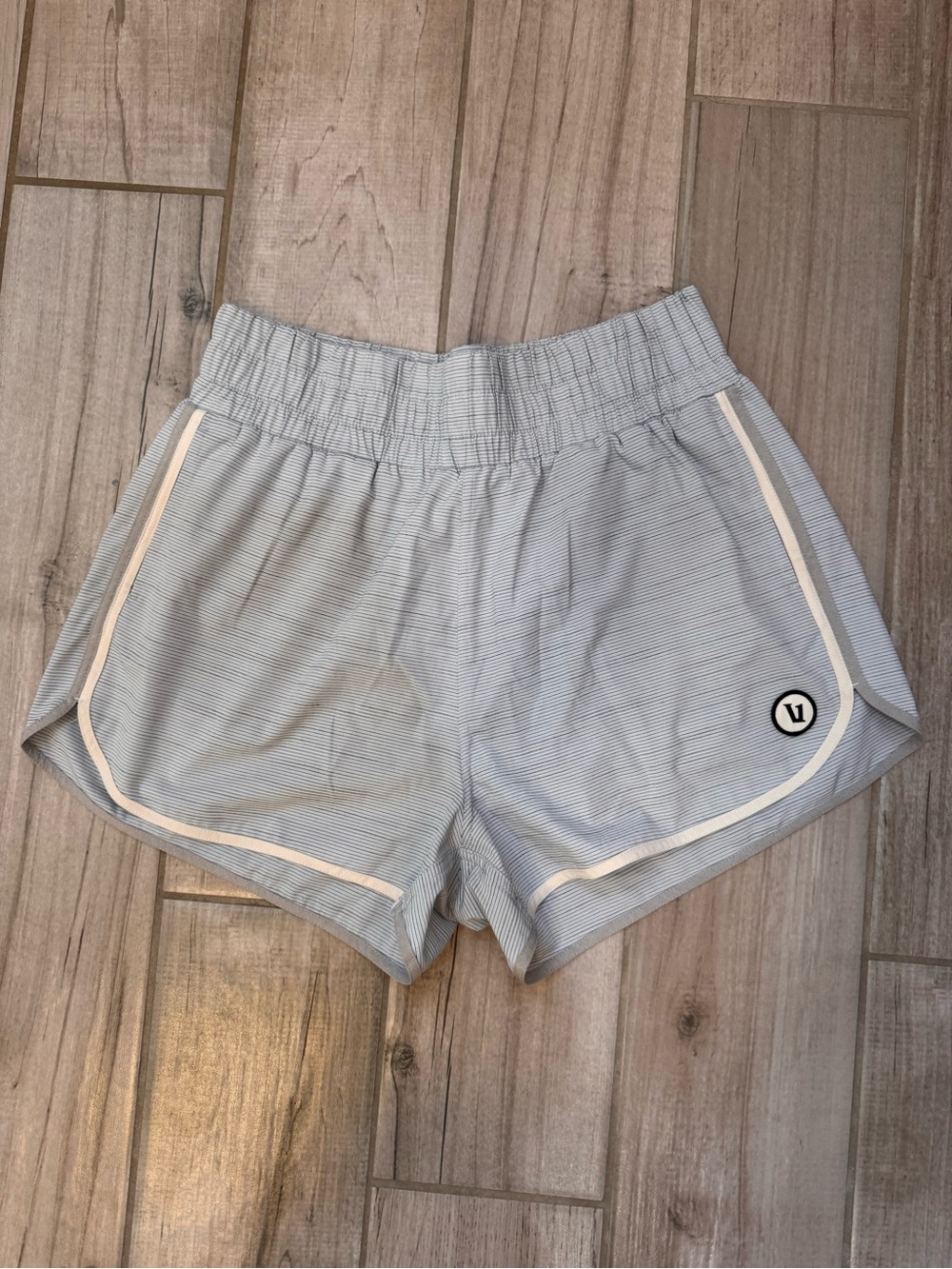 Vuori Pale Blue Striped Athletic Shorts with White Piping